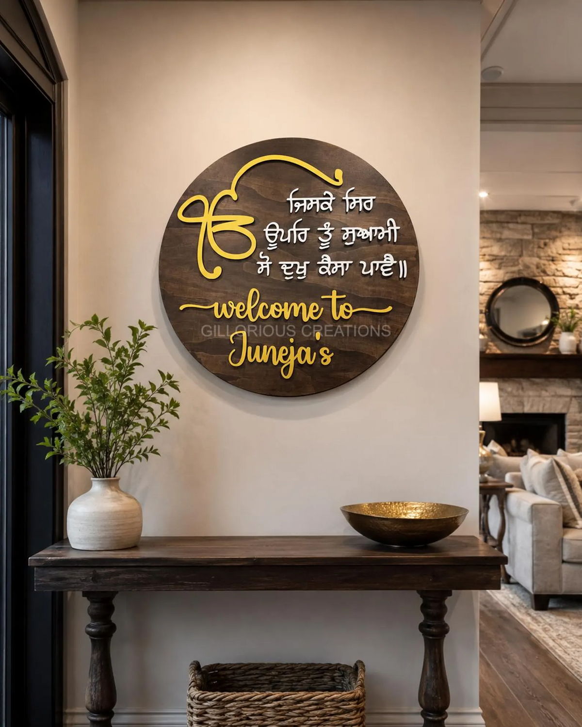 Personalized Sikh wooden welcome sign with Ik Onkar and Jiske Sir Upar Tu Swami Gurbani, shown with Juneja family name