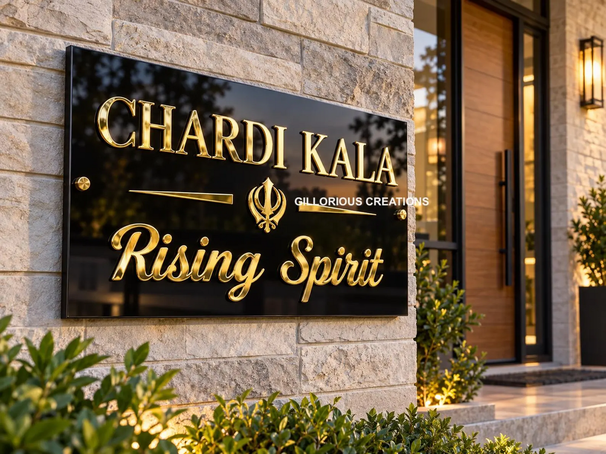 Chardi Kala Rising Spirit acrylic Sikh wall sign with mirror gold lettering on black acrylic, close-up exterior view